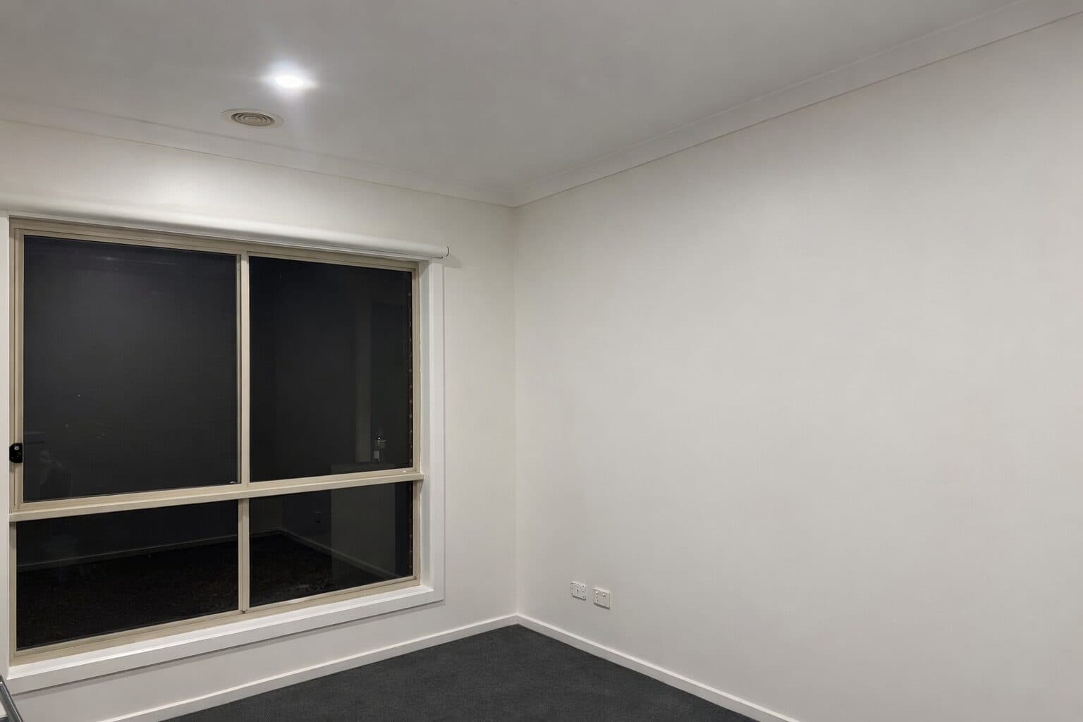 Before — scuffed and marked interior bedroom wall with old paint in a VIC home, prepped with masking tape by VD Painting